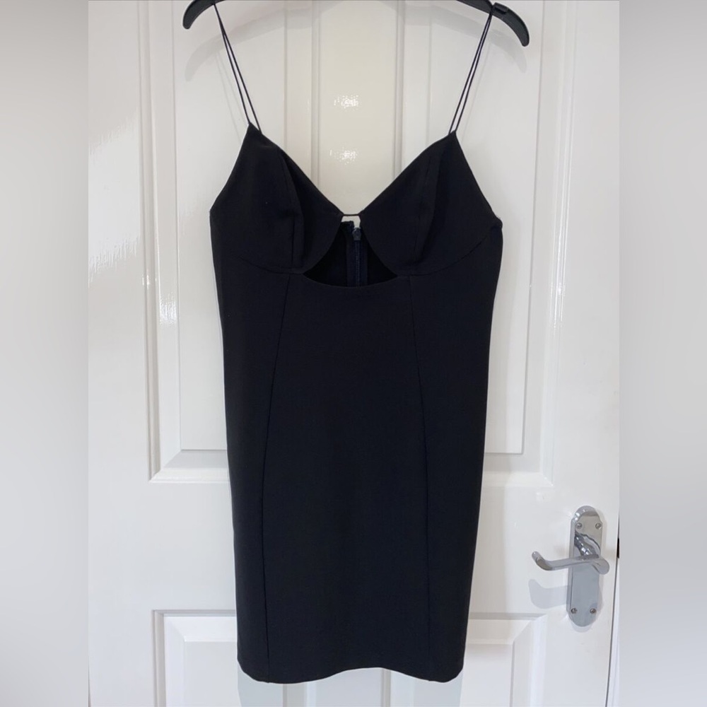 Cute mini black dress from Topshop, brand new never worn!!